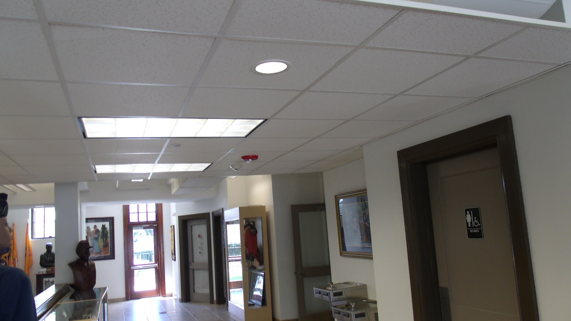 Completed institutional hallway with display cases